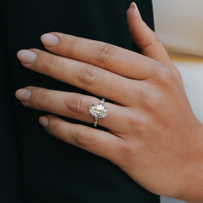 Floating Marquise Oval Side Stone Engagement Ring