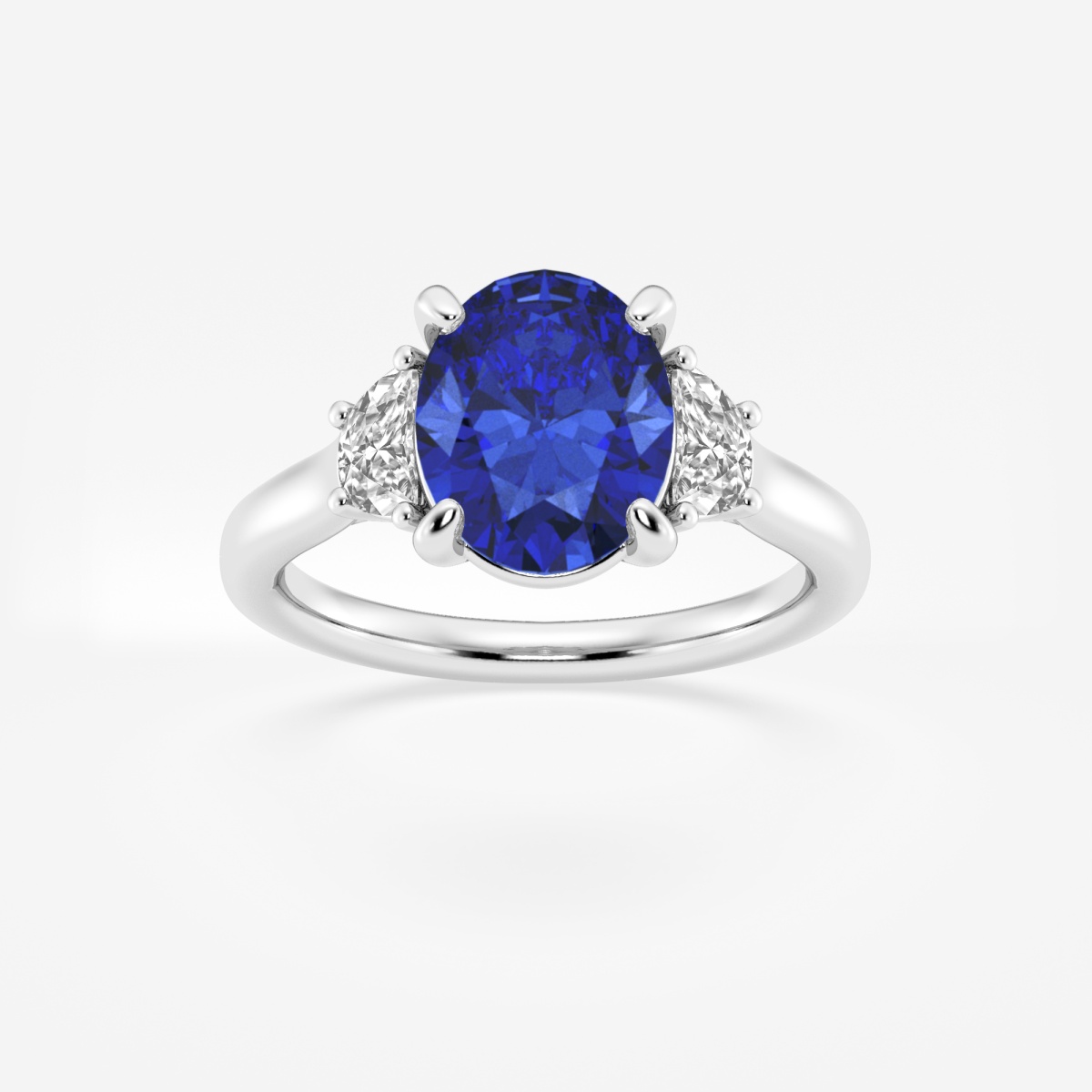 10x8mm ctw Oval Cut Created Sapphire and 1/2 ctw Lab Grown Diamond Three-Stone Engagement Ring